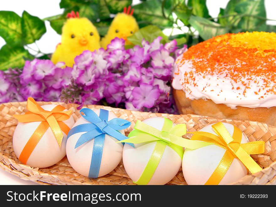 Easter background with cake, eggs and two chicken