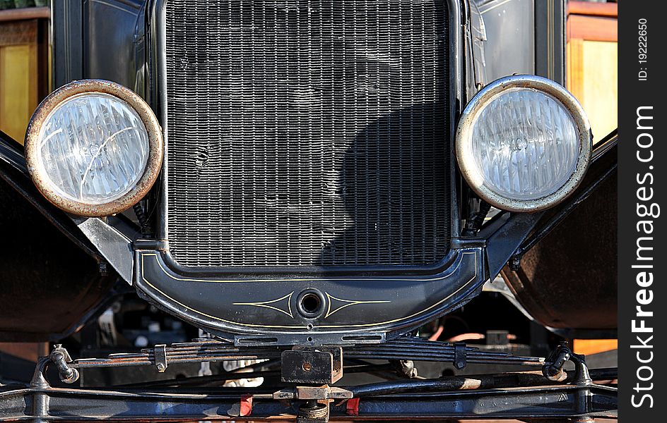 A Closeup Of The Front Of An Antique Pickup Truck. A Closeup Of The Front Of An Antique Pickup Truck