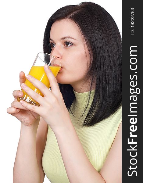 Happy young woman with a glass of refreshing oranges juice - isolated on white. Happy young woman with a glass of refreshing oranges juice - isolated on white.