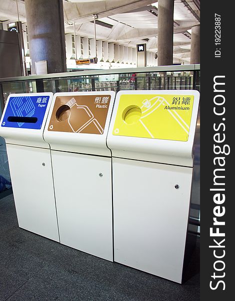 Recycle bins for paper, plastic, and aluminium.