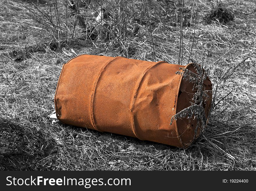 Old rusty barrel on black&white background. Old rusty barrel on black&white background