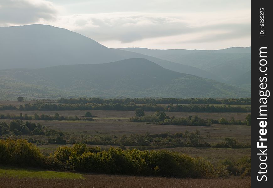 Mountain landscape with shrubs in the foreground. Crimea, Ukraine