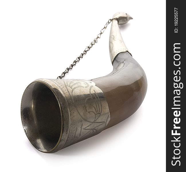 Isolated georgian drinking cows horn