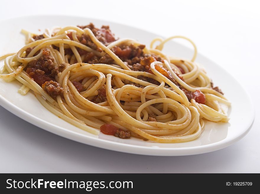 Spaghetti bolognese on the white plate