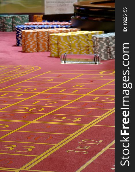 Table roulette and stacks chips for betting