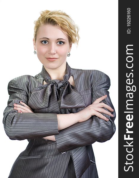 Self-assured woman in a business suit posing. Self-assured woman in a business suit posing