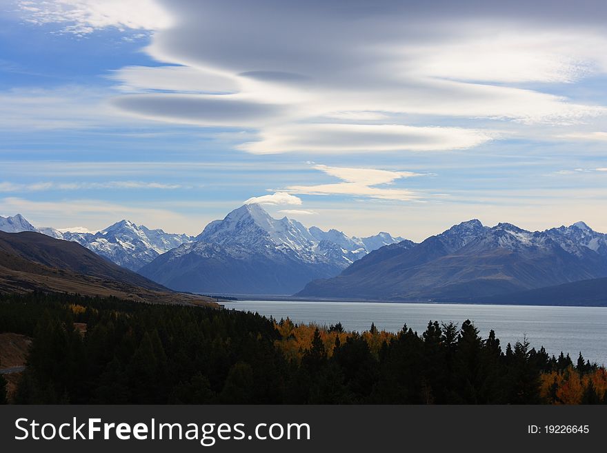 Looking towards Mt Cook over autumn trees and Lake Pukaki. Looking towards Mt Cook over autumn trees and Lake Pukaki.