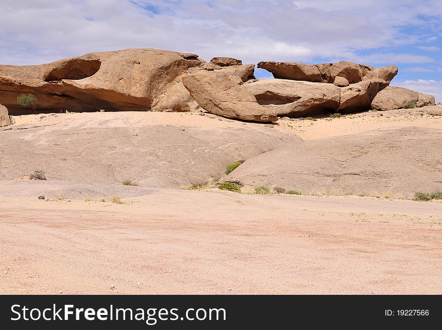 Vogelfederberg rock made of sandstone in Namib-Naukluft national park in Namibia. Vogelfederberg rock made of sandstone in Namib-Naukluft national park in Namibia.