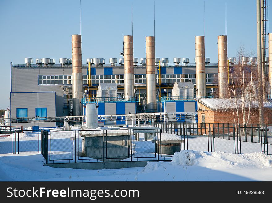 Modern industrial building. Industrial refrigeration and transportation of gas under high pressure