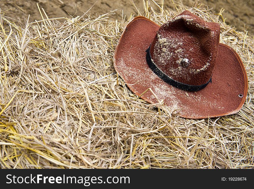 Brown cowboy hat on straw