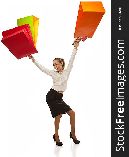 Woman swinging  with shopping bags