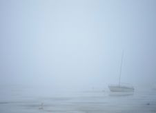 Sailing Boat In Milky Fog Royalty Free Stock Photo
