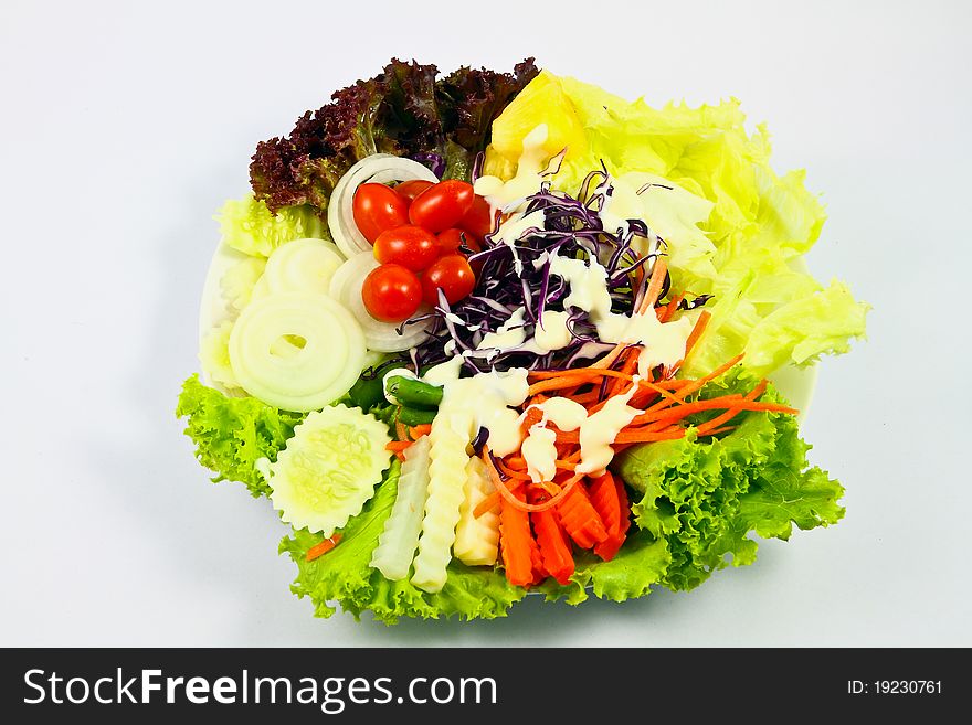 Mix vegetable salad on plate. Mix vegetable salad on plate