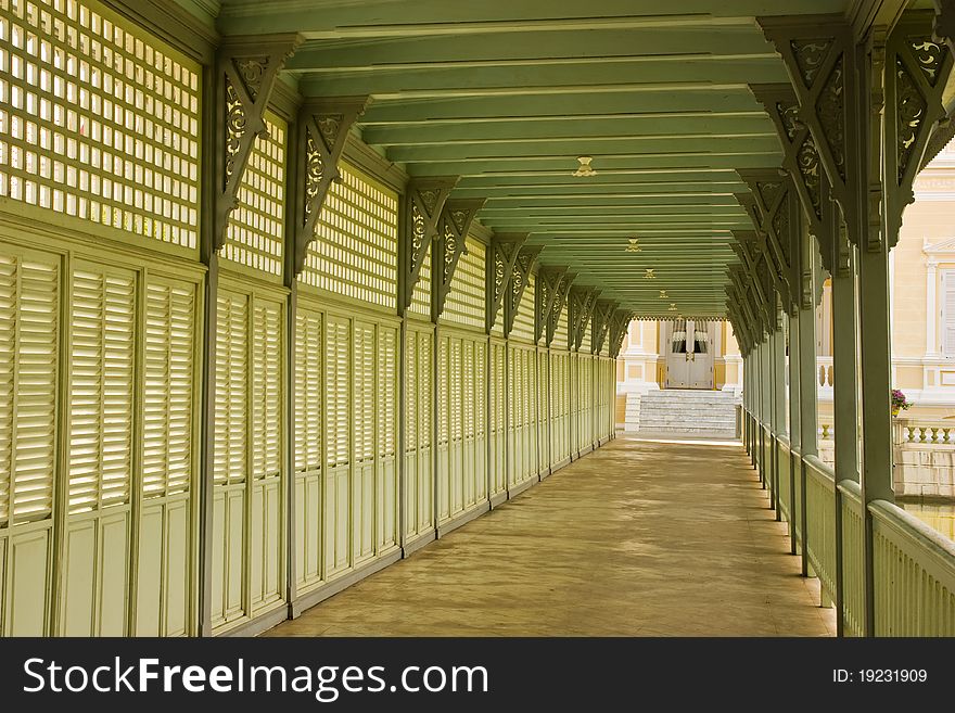 Terrace on old house with wooden sun blind