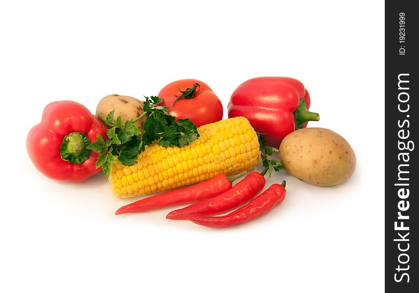 Tomato; potato; corn, pepper isolated on a white background. Tomato; potato; corn, pepper isolated on a white background