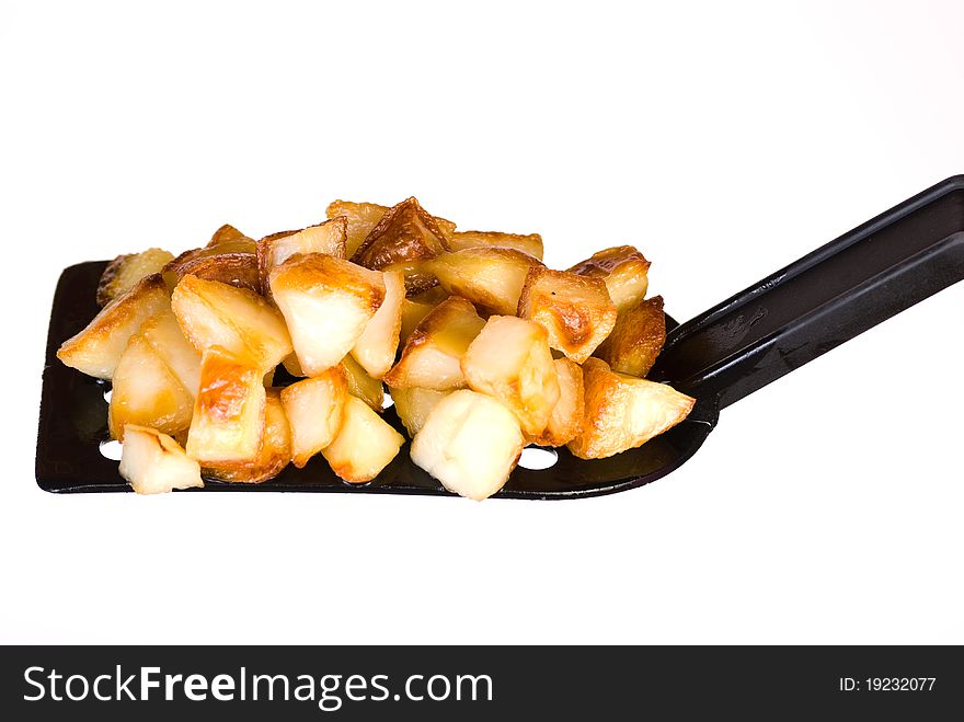 Fried potatoes on paddle isolated on white
