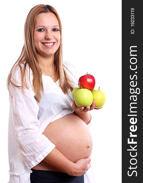 Smiling pregnant woman with apples, baby