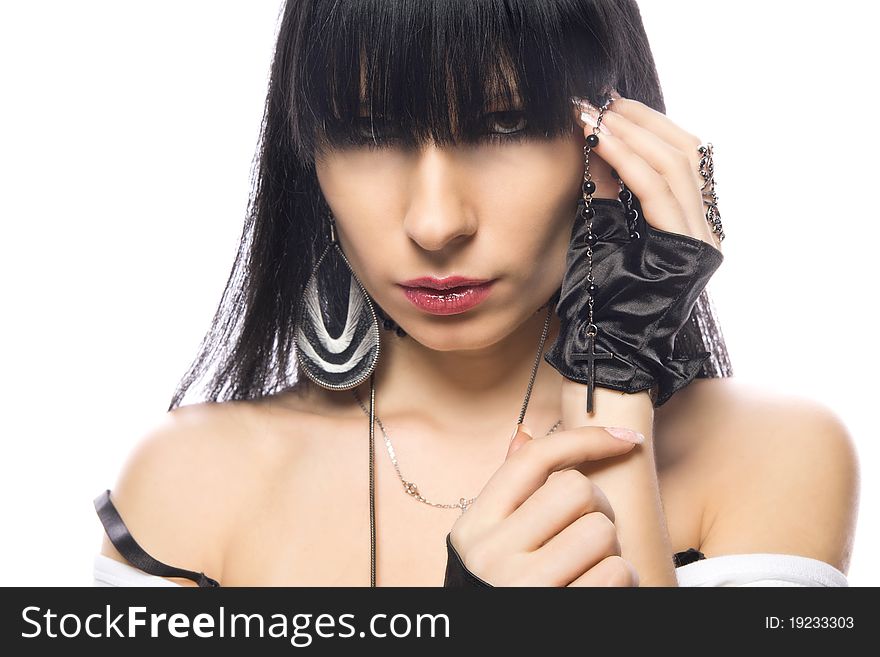 Close-up portrait of a young beautiful brunette girl with long hair and long nails. Close-up portrait of a young beautiful brunette girl with long hair and long nails.