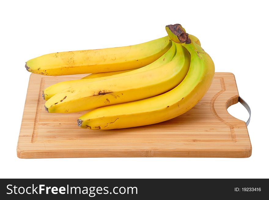 Bunch of bananas on the kitchen blackboard isolated on a white background