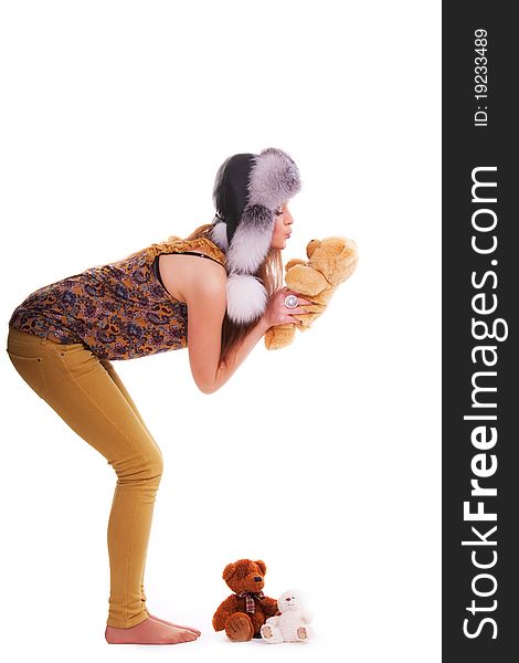 Beautiful longhair girl is holding the teddy bear. Beautiful longhair girl is holding the teddy bear