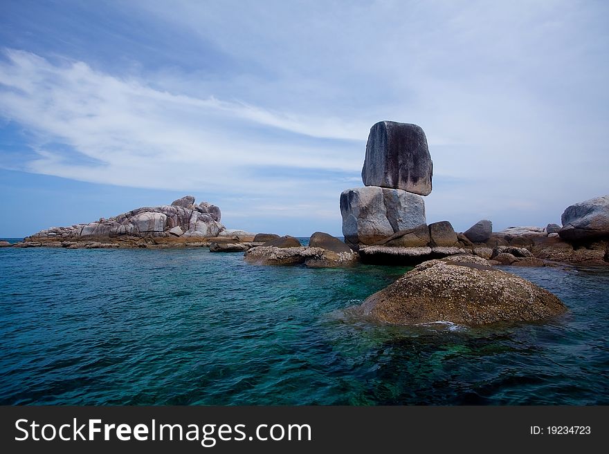 Beautiful tropical beach with big stones. Thailand