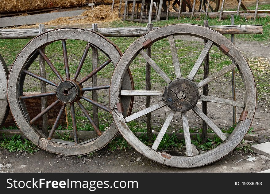 Two old broken wheel from vintage cart. Two old broken wheel from vintage cart