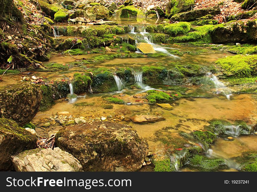 Cascade of the mountain river