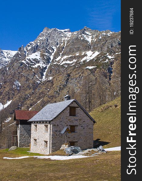 A little village in a mountain landscape. A little village in a mountain landscape