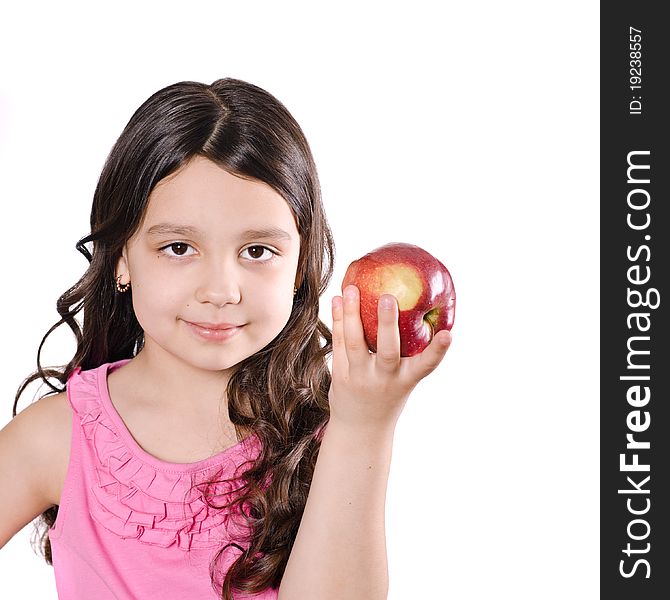 Portrait of a pretty girl with apple on a white background