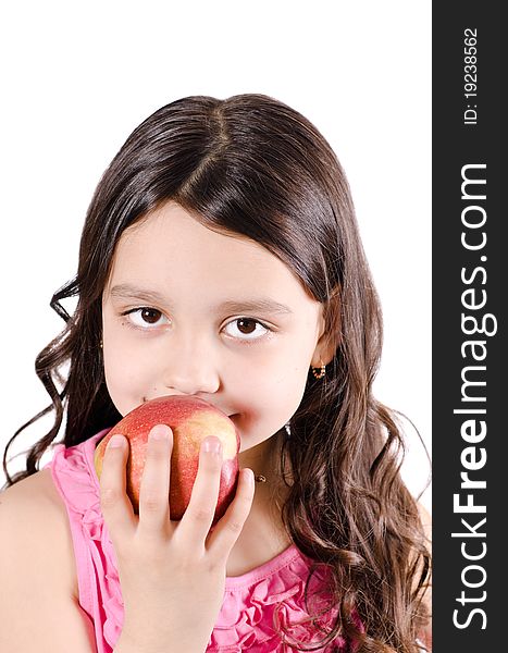 Portrait of a pretty girl with apple on a white background