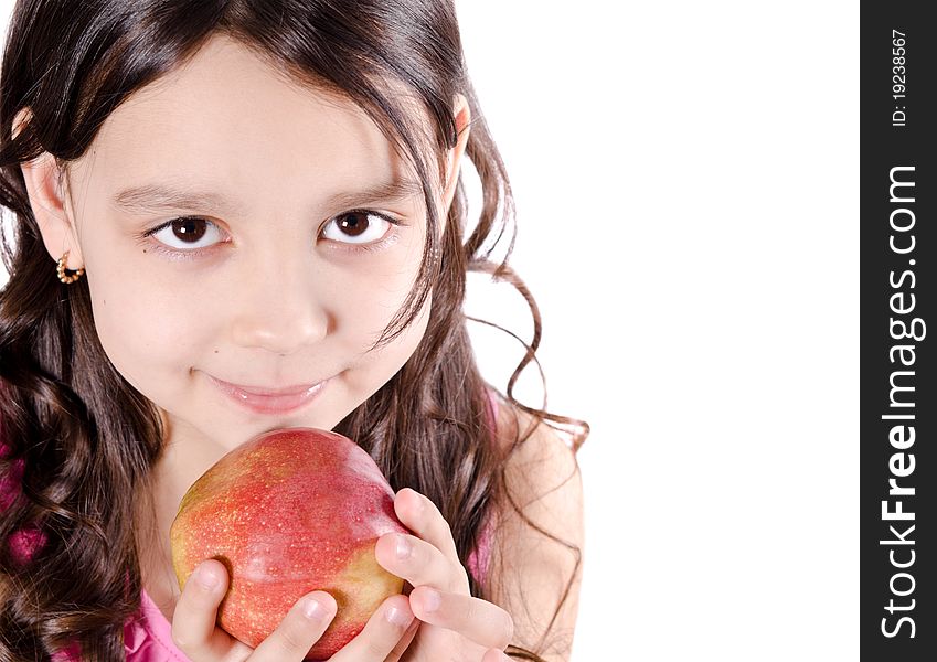 Portrait of a pretty girl with apple on a white background