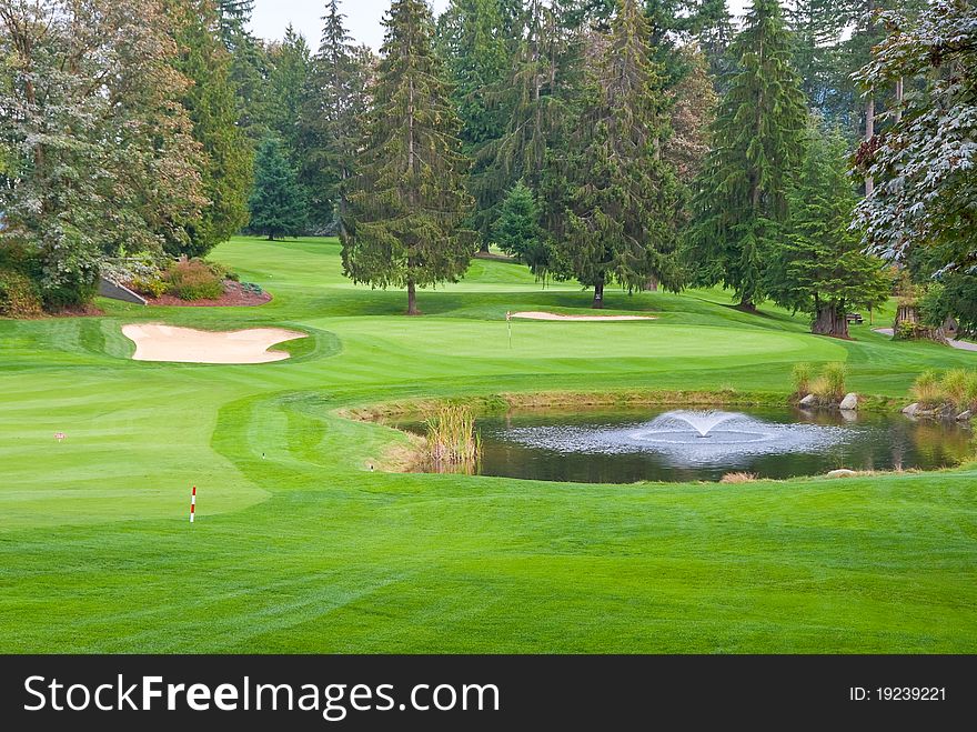 Golf place with gorgeous green and pond. Golf place with gorgeous green and pond.