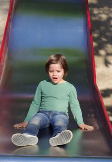 Boy On The Slide Royalty Free Stock Photos Boy On The Slide Royalty Free Stock Photos