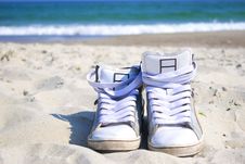 Sneakers On The Beach Stock Photo Sneakers On The Beach Stock Photo
