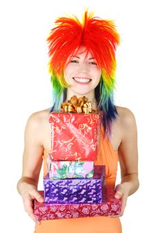 Woman In Multicolored Wig With Many Gifts Royalty Free Stock Image Woman In Multicolored Wig With Many Gifts Royalty Free Stock Image