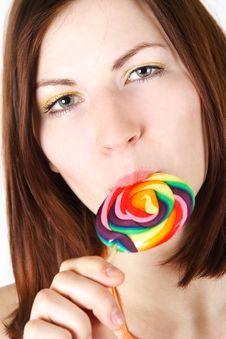 Young Brunette Girl Eating Big Lollipop Stock Photo Young Brunette Girl Eating Big Lollipop Stock Photo