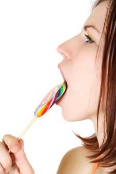 Young Brunette Girl  Licking Big Lollipop Royalty Free Stock Photography