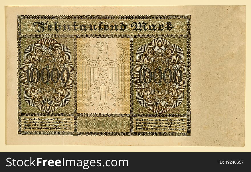 Front or obverse side of obsolete 1922 German Y 10,000 Reichsbanknote dated January 19, 1922 showing German coat of arms. Also, known as the “Vampire Note”. Front or obverse side of obsolete 1922 German Y 10,000 Reichsbanknote dated January 19, 1922 showing German coat of arms. Also, known as the “Vampire Note”.