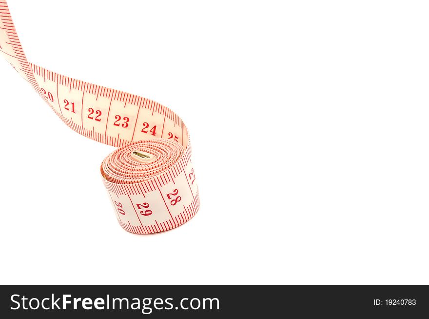 A measuring tape on a white background with copy space. A measuring tape on a white background with copy space