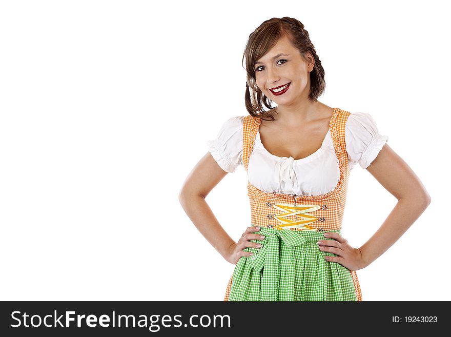 Young, self-confident, Bavarian woman in Oktoberfest dirndl cloth.Isolated on white background. Young, self-confident, Bavarian woman in Oktoberfest dirndl cloth.Isolated on white background.