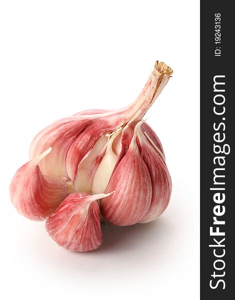 Garlic isolated on white with soft shadow. Cliping path with no shadow saved