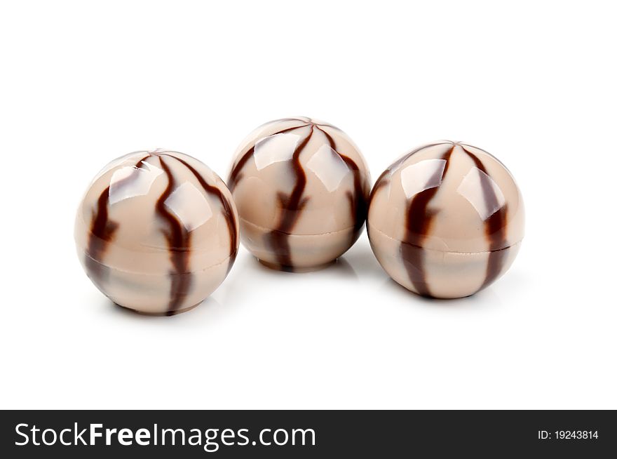 Delicious chocolate candy isolated on white background