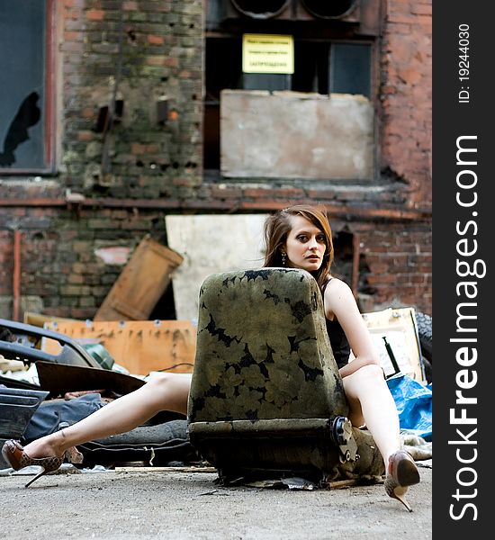The girl in the ruins of the destroyed factory in Russia. The girl in the ruins of the destroyed factory in Russia