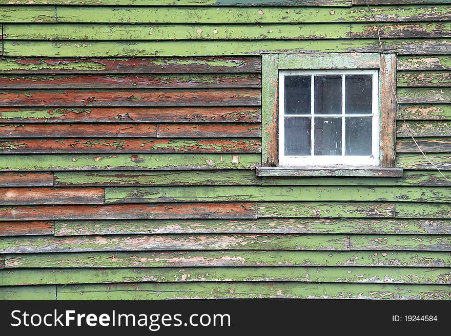 Old grunge green wooden panel with glass windows. Old grunge green wooden panel with glass windows