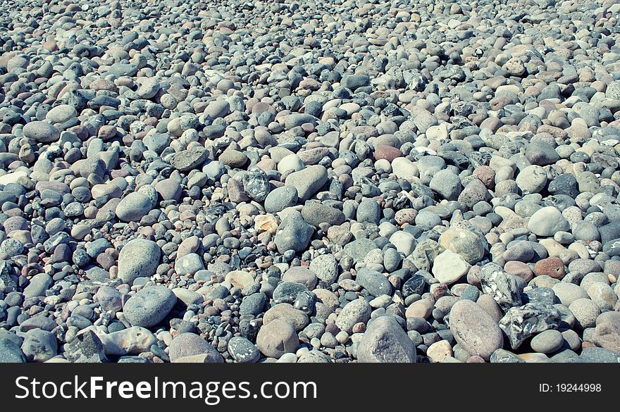 Stock Photo: abstract background with round peeble stones