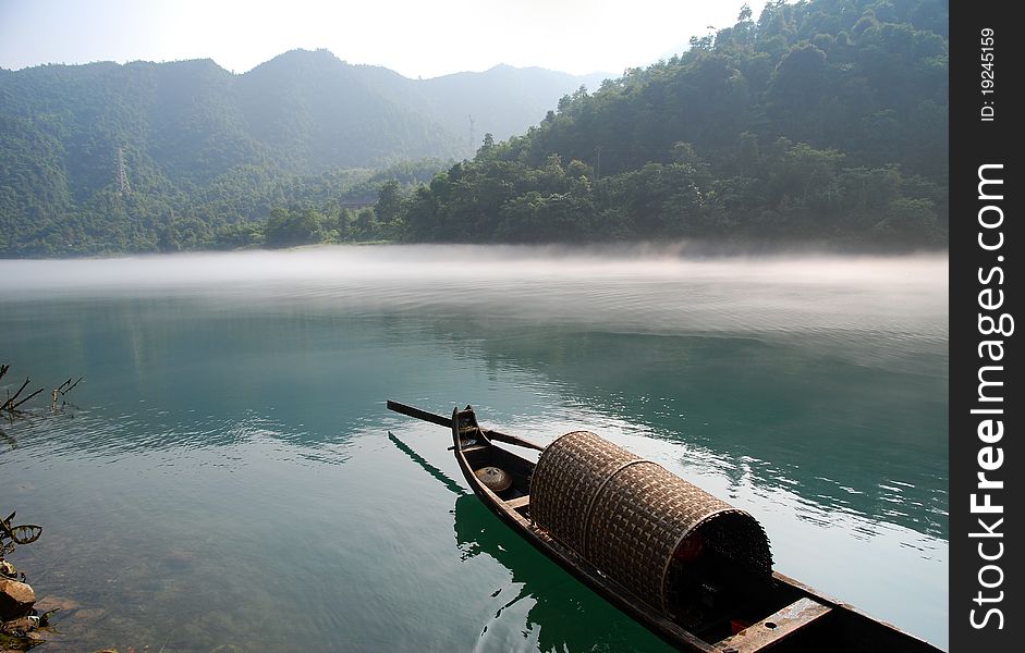 Boat In The Morning River