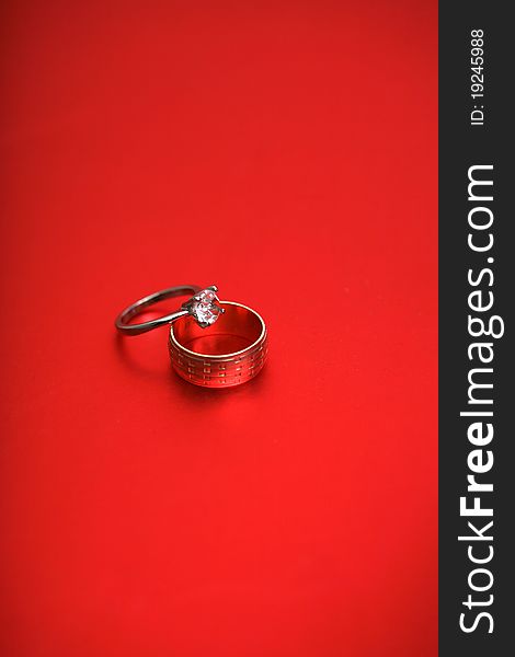 Wedding rings and red backgroun. Wedding rings and red backgroun