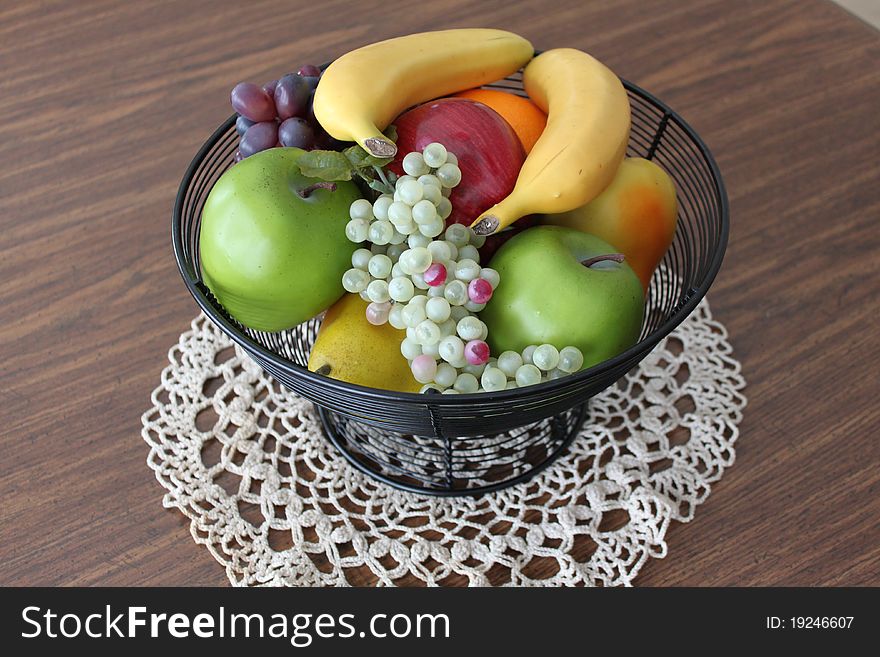 Bowl of fruit on lace