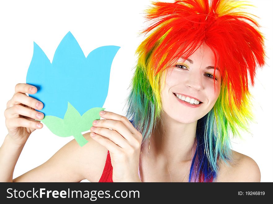 Beauty woman in multicolored wig with paper flower