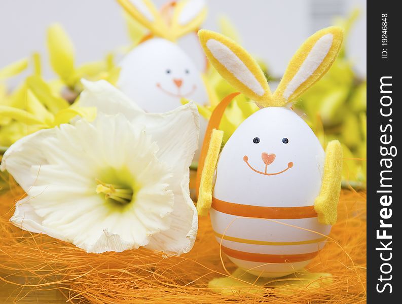 Bunny shaped easter eggs and daffodil